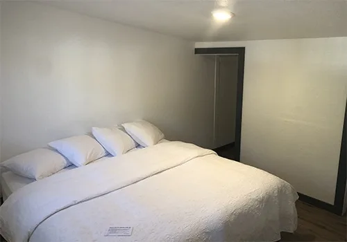 The Kendall Suite featuring a king bed in a spacious second-floor room